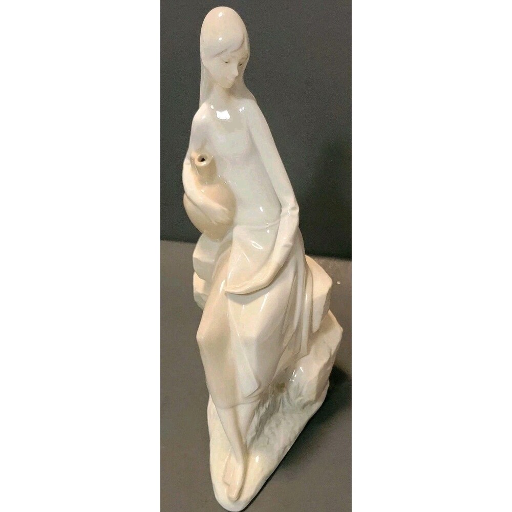 NAO by Lladro #31-GIRL SITTING ON ROCK WITH JUG - Porcelain Figurine